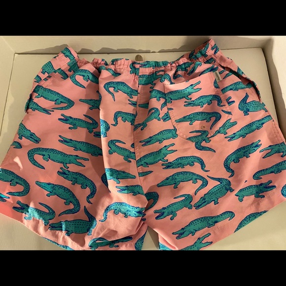 pink alligator swim trunks